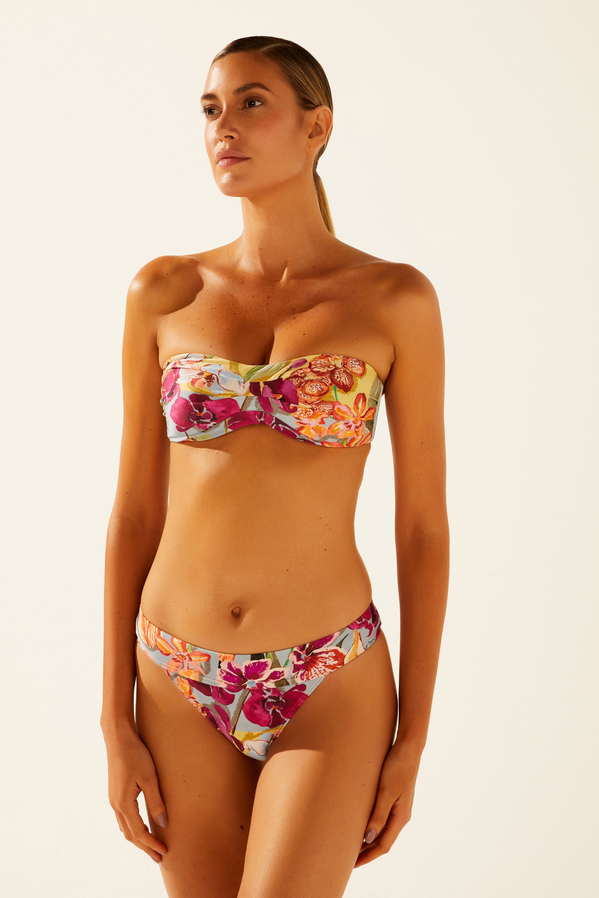 Tankini with Floral top and Striped Bottoms.